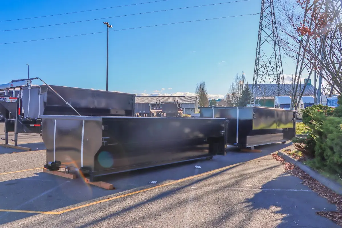 Roll-off dumpster ready for waste disposal at job site for 2 Yard Dumpster Rental in Madison Heights